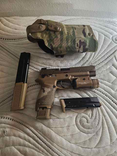 Sig M17 w/ extra 30 rd magazine, tlr-1 light, and 