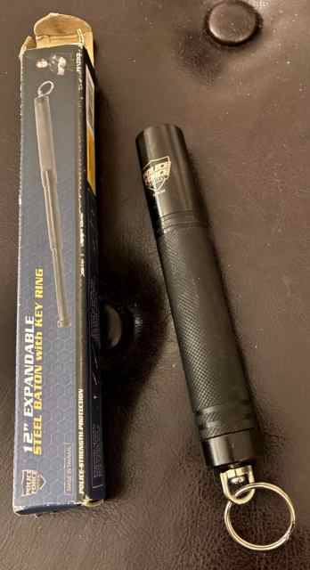 New in box expandable baton