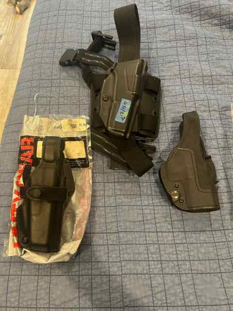 Tons of holsters - Glock, sig, revolver, etc