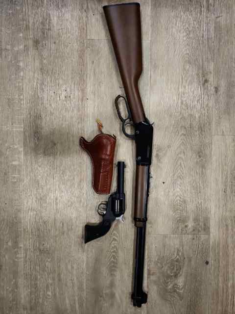 Henry and Ruger 22s. As new