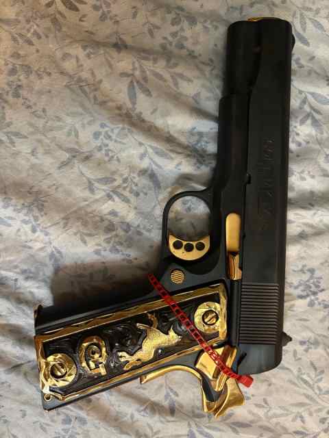 Colt 1911 80 series gold and blued 