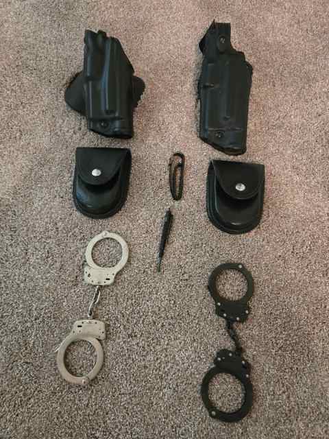 Left hand Safariland holsters LH + cuffs